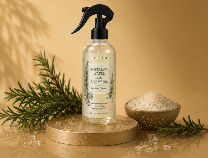 Elbue Rosemary Water and Rice Water bottle on a beige background with greenery.